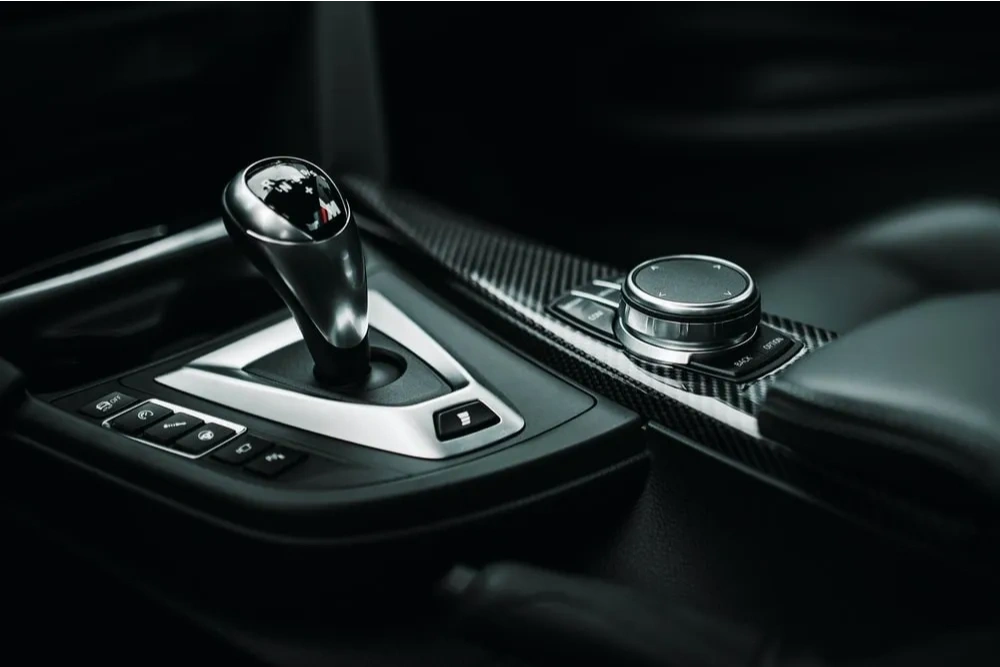 Cleaned gear selector and centre console inside a vehicle cabin